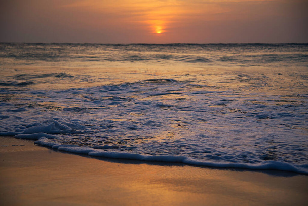 sunset on the ocean in summer on vacation - Foto, imagen