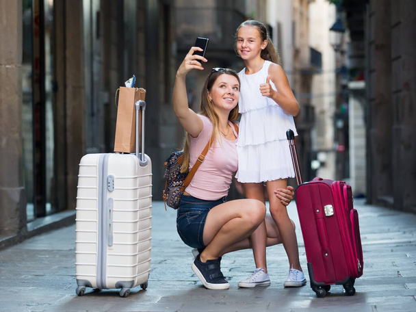 tourists doing selfie on the street - Photo, Image