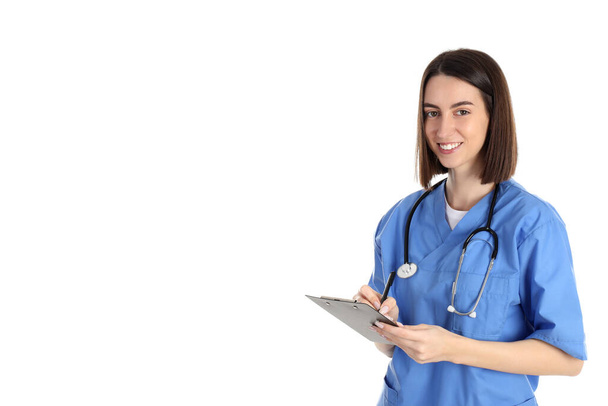 Έννοια του εργαζομένου στον τομέα της υγειονομικής περίθαλψης με νεαρή γυναίκα απομονωμένη σε λευκό φόντο - Φωτογραφία, εικόνα