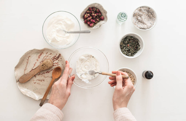 woman making a jar of yogurt and fresh ingredients on white background. - Fotoğraf, Görsel