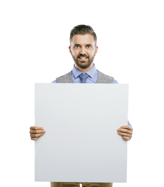 Businessman holding blank advertisement - 写真・画像