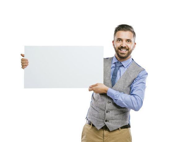 Businessman holding blank advertisement - Φωτογραφία, εικόνα