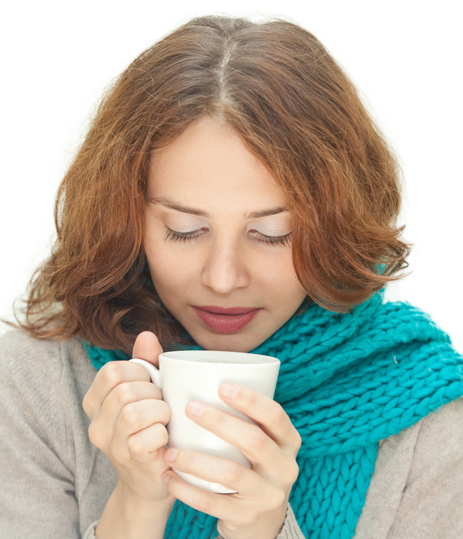 young woman in blue scarf with white mug isolated on white backg - Foto, Imagen