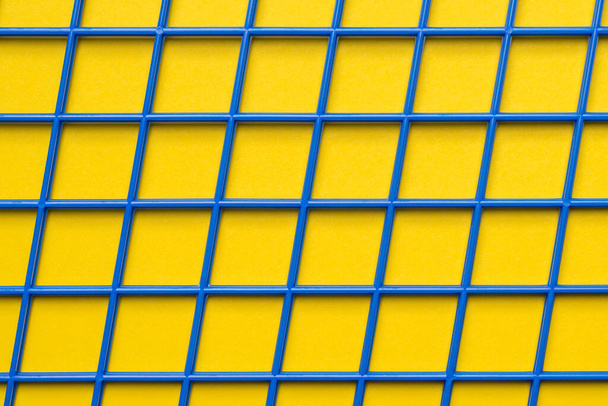 Geometric grid texture as background or banner. Crossed parallel blue plastic lines. - Fotoğraf, Görsel