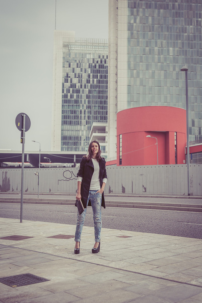 Pretty girl posing in the city streets - Photo, Image