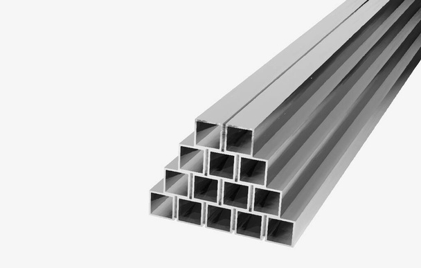 Apilado de metal cuadrado de pared gruesa perfil tubo lateral view.Vector ilustración para empresas e industriales. - Vector, Imagen