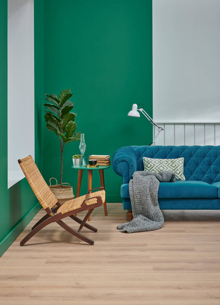 Blue sofa pillow and blanket decoration, green and white concept, lamp plant coffee table style, carpet, chair and home design, interior concept. - Foto, immagini