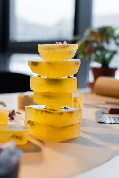 Craft soap bars on blurred table at home  - Fotografie, Obrázek