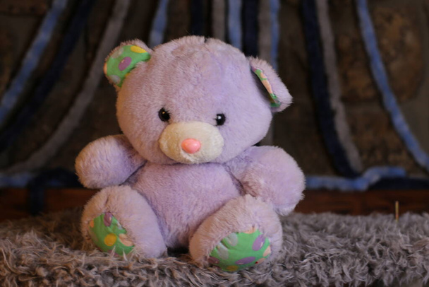 крупним планом знімок рожевого плюшевого ведмедика м'яка іграшка
 - Фото, зображення