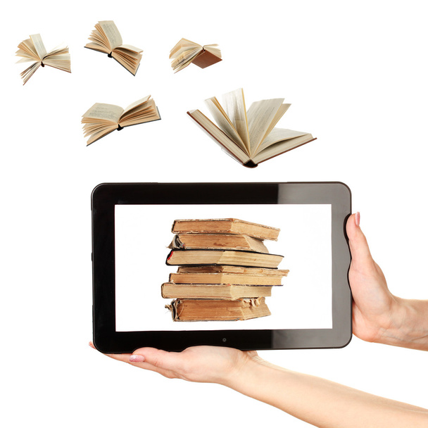 Information transfer.Books flying in tablet isolated on white - Foto, imagen