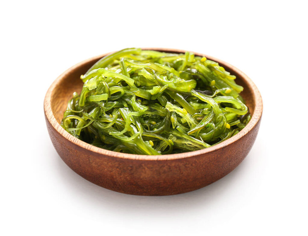 Plate with healthy seaweed salad on light background - Photo, Image