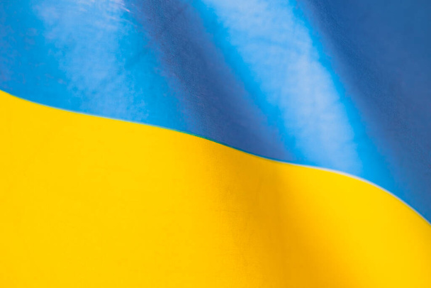 Flag of Ukraine, UA. Blue and yellow colors. Close up shot, background - Photo, Image