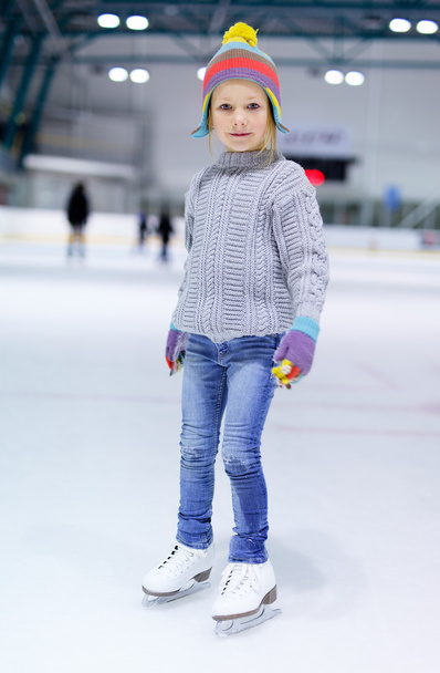 Little girl ice skating - 写真・画像