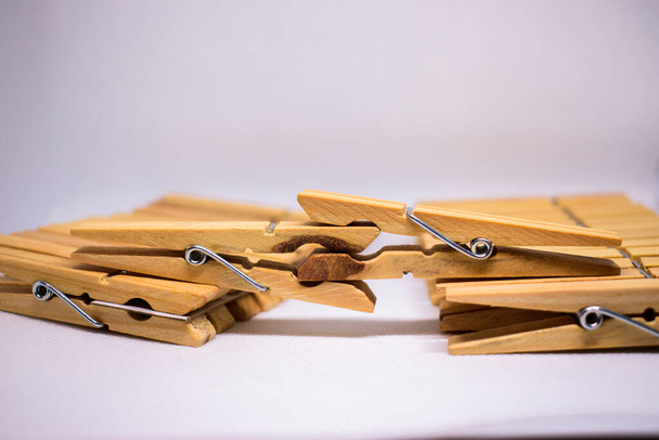 clothespins on a wooden background - Photo, Image