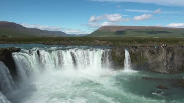 Iceland. Water crashing at powerful Godafoss waterfall. Idyllic view of beautiful Godafoss waterfall. It is a spectacular Icelandic waterfall on - Footage, Video