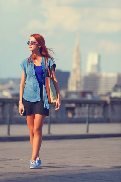 Modern girl walking on the street in Brussels - Fotó, kép