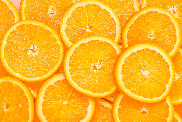 Slices of juicy orange as background, closeup - Photo, Image
