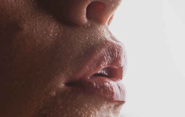 Girl with sexy wet lips. Lip and skincare. Hygienic lipstick. Herpes treatment. - Foto, afbeelding