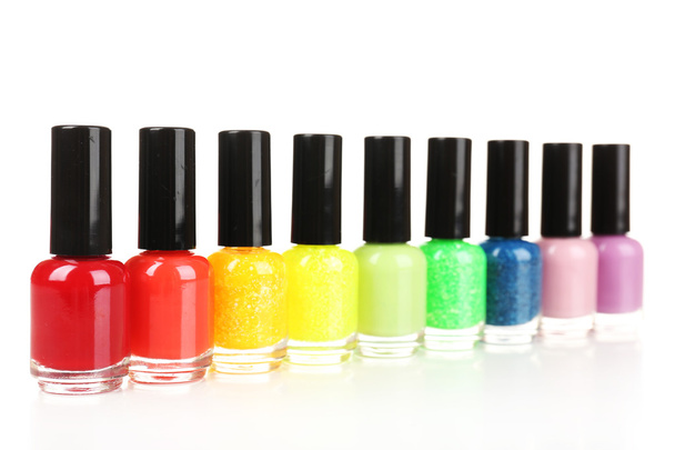 Colorful nail polishes, isolated on white - Photo, image