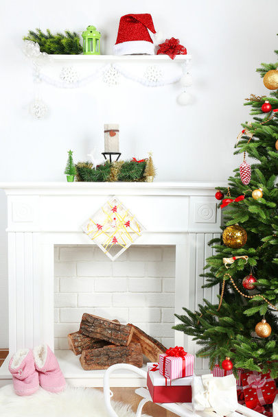 Christmas tree near fireplace - Photo, image