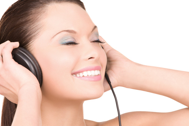 Happy woman in headphones - Photo, image