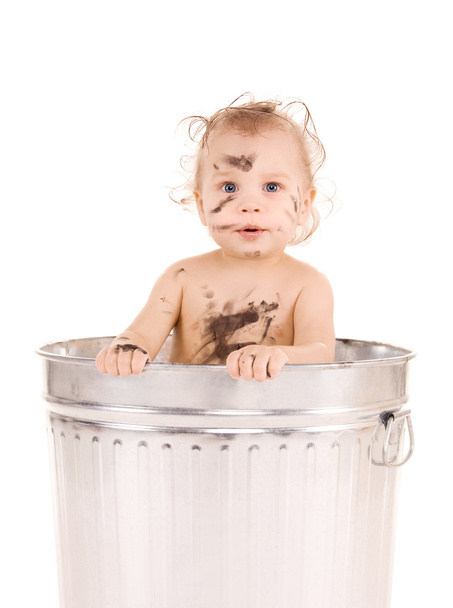 Baby in trash can - 写真・画像