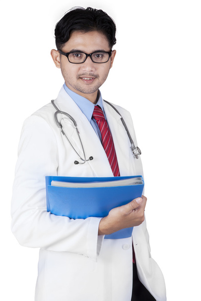 General doctor holding a folder - Фото, изображение
