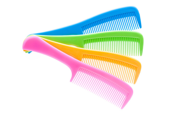 Stack of colorful hair comb  on white background. - Photo, Image