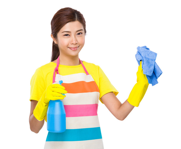 Housewife with detergent spray and towel - Foto, imagen