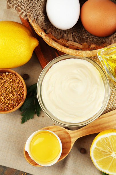 Mayonnaise ingredients on wooden background - Photo, image