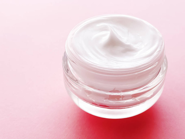 Face cream jar on pink background, beauty, skincare and cosmetic product. - Photo, Image