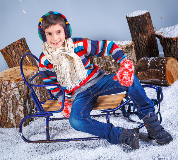 Winter Fashion. Portrait of adorable happy boy. - Fotoğraf, Görsel