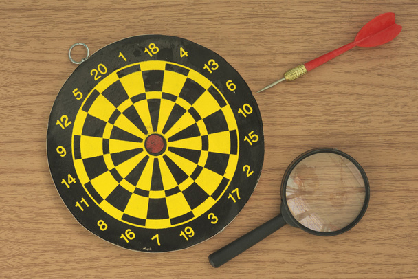 Dart, target, and Magnifier - Photo, Image