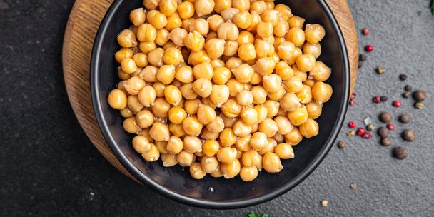 chickpeas boiled chickpea legumes Turkish peas fresh portion healthy meal food diet snack on the table copy space food background rustic top view keto or paleo diet veggie vegan or vegetarian food - Photo, Image