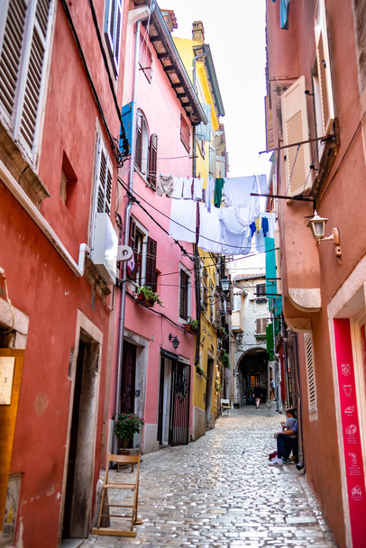 Narrow Alley With Street Life In The Old Town Of The City Of Rovinj In Croatia - Photo, Image