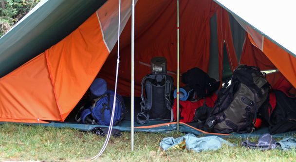 backpacks and bags in the big tent - Photo, Image