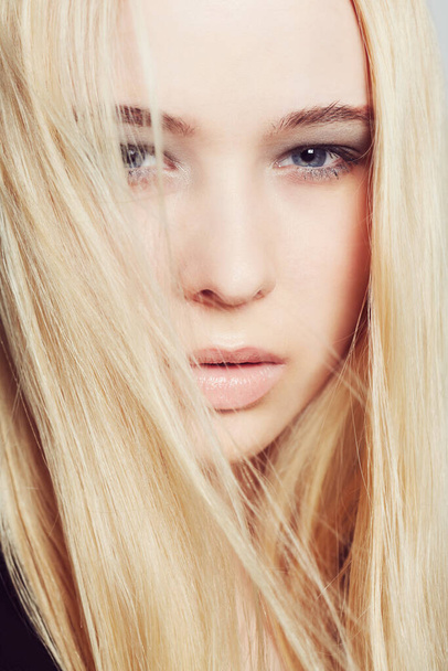 Shes confident and naturally beautiful. Closeup portrait of an attractive young blonde woman in studio. - Фото, зображення