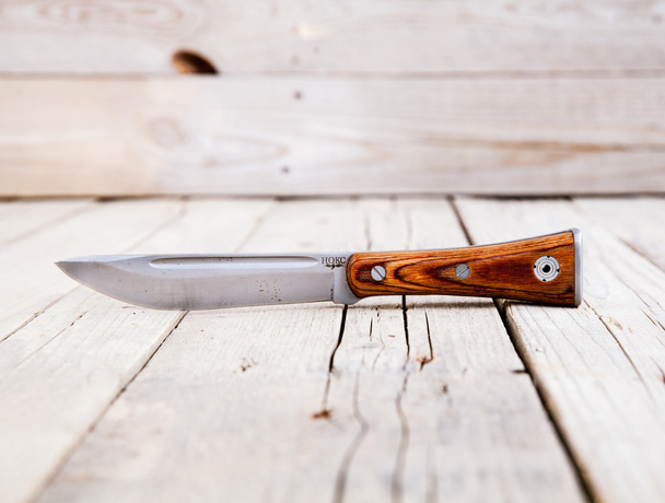 Knife on wooden table with copy space - Photo, Image