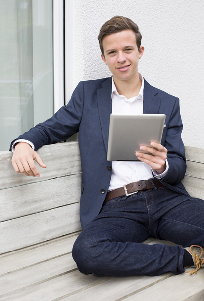 young man with tablet - 写真・画像