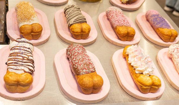 Belgian penis shape waffles with toppings on showcase. Brussels - Fotoğraf, Görsel