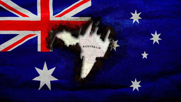 Australijska Flaga z wypaloną dziurą odsłaniającą zabytkową mapę Australii - Zdjęcie, obraz