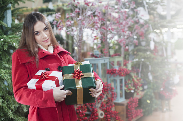 mujer compra regalos de Navidad
 - Foto, Imagen