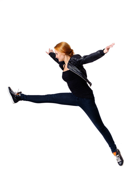 Jumping young woman - 写真・画像
