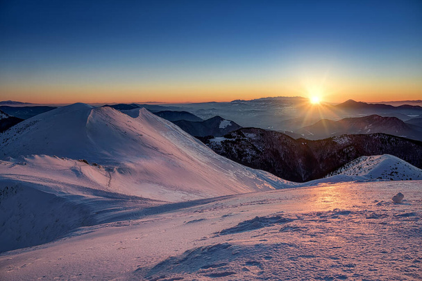 view of Chleb in Mala Fatra on snowy slopes during sunrise - Fotoğraf, Görsel