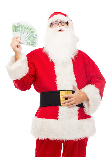 man in costume of santa claus with euro money - Fotoğraf, Görsel