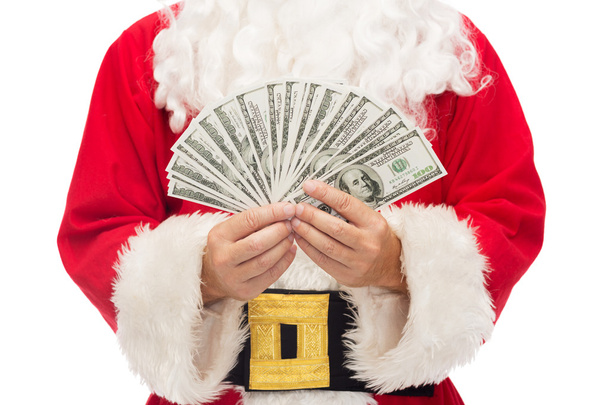 close up of santa claus with dollar money - Foto, afbeelding