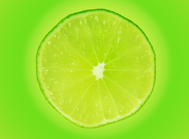 Slice of fresh lime isolated - Fotoğraf, Görsel