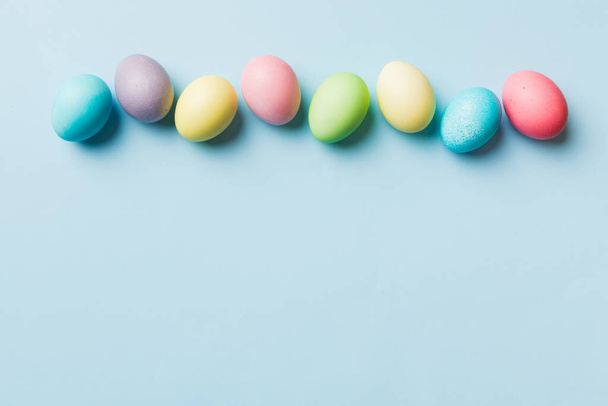 holiday preparation Multi colors Easter eggs on colored background . Pastel color Easter eggs. holiday concept with copy space. - Foto, afbeelding