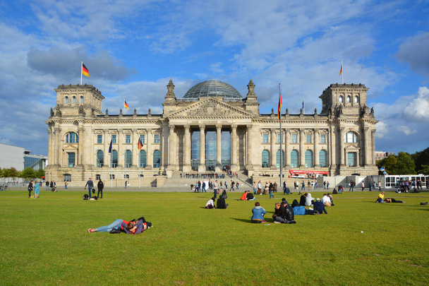 BERLIN GERMANY - 09 24 17: The Reichstag officially Deutscher Bundestag Plenarbereich Reichstagsgebaude is a historic edifice in Berlin constructed to house the Imperial Diet of the German Empire. - Foto, Imagen
