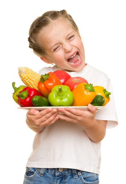 holčička s ovocem a zeleninou na bílém pozadí - Fotografie, Obrázek